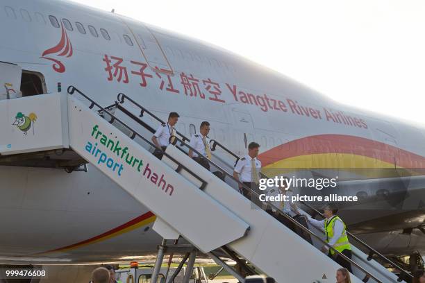 The crew leaves the aircraft of the type Boeing 747-400 of the Chinese cargo airline Suparna at the Hahn airport in Hahn, Germany, 28 August 2017....