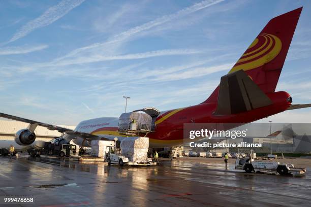 An aircraft of the type Boeing 747-400 of the Chinese cargo airline Suparna is unloaded after its first flight at the Hahn airport in Hahn, Germany,...