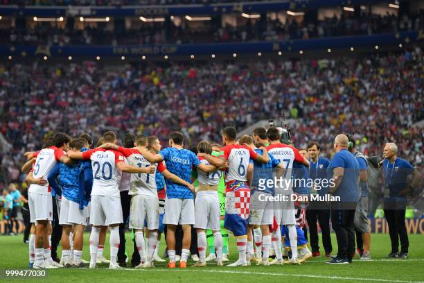 Croatia players form a huddle following the 2018 FIFA World Cup Final between France and Croatia at Luzhniki Stadium on July 15, 2018 in Moscow,...