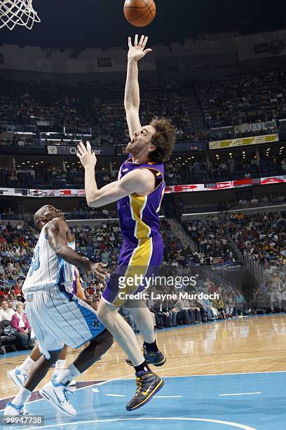 Pau Gasol of the Los Angeles Lakers puts a shot up against the New Orleans Hornets on March 29, 2010 at the New Orleans Arena in New Orleans,...