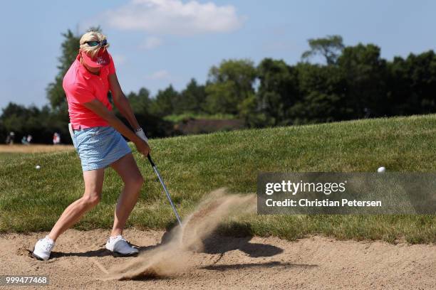 Trish Johnson of England plays from the bunker on the fourth hole during the final round of the U.S. Senior Women's Open at Chicago Golf Club on July...