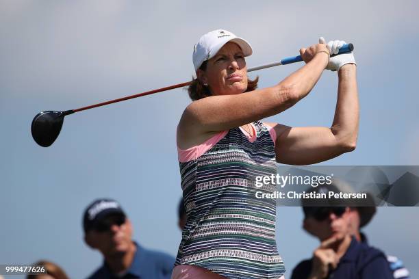 Juli Inkster plays a tee shot on the fourth hole during the final round of the U.S. Senior Women's Open at Chicago Golf Club on July 15, 2018 in...