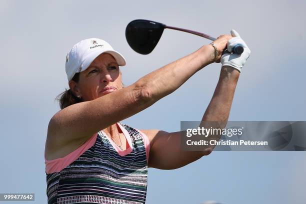 Juli Inkster plays a tee shot on the fourth hole during the final round of the U.S. Senior Women's Open at Chicago Golf Club on July 15, 2018 in...