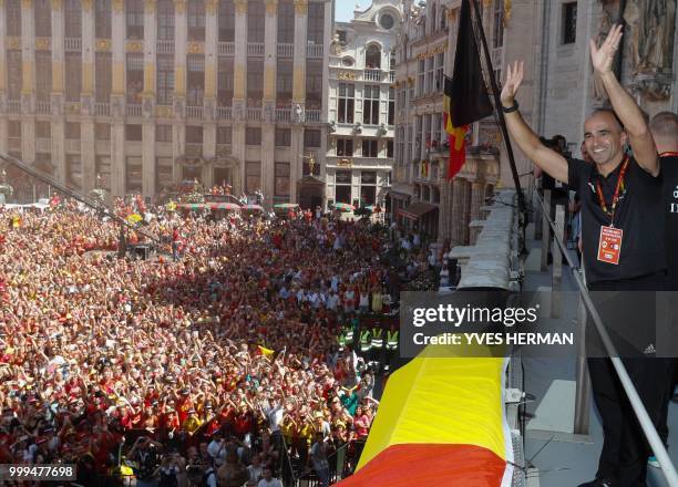 Belgium's head coach Roberto Martinez celebrates at the balcony in front of more than 8000 supporters at the Grand-Place, Grote Markt in Brussels...