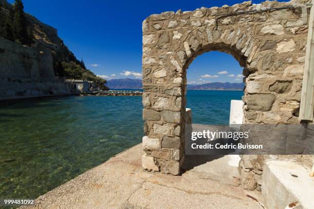 aegean sea through a door - buisson stock pictures, royalty-free photos & images