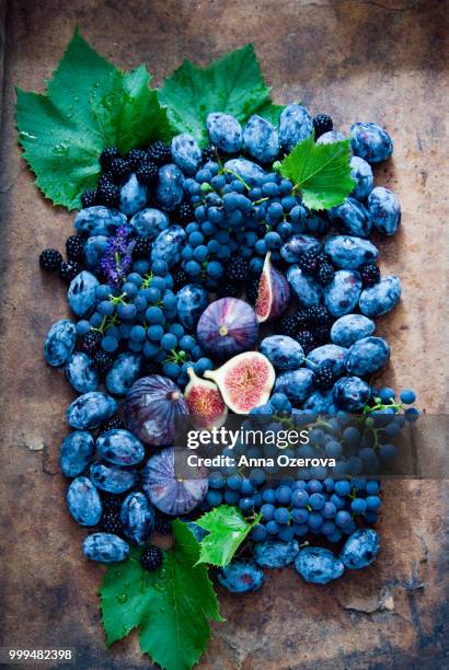 fresh figs, grapes, prunes and dewberry - dewberry stock pictures, royalty-free photos & images