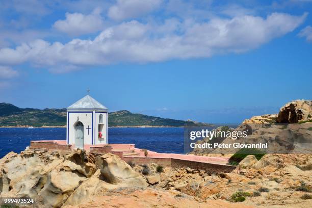 chapel on the coast, isola spargi in back, maddalena, national park la maddalena archipelago, sardinia, italy - isola stock pictures, royalty-free photos & images