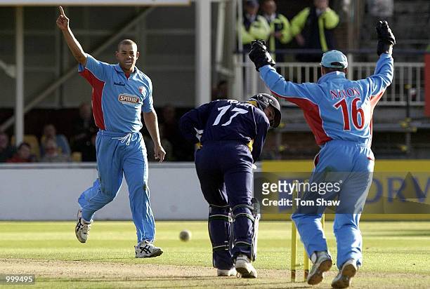 Andrew Symonds of Kent celebrtates taking the wicket of Michael Powell of Warwickshire during the Warwickshire Bears v Kent Spitfires Norwich Union...