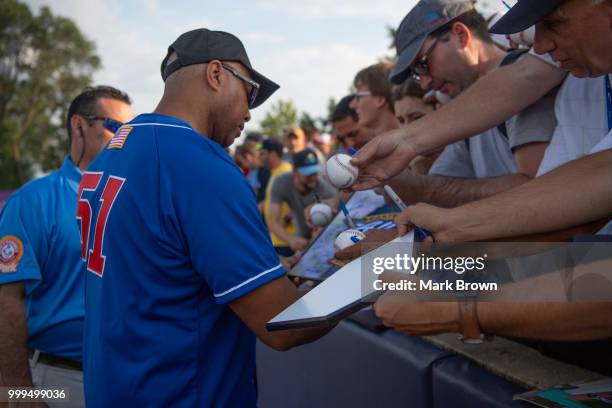 Former New York Yankee Bernie Williams signs autographs before the 2018 Eastern League All Star Game at Arm & Hammer Park on July 11, 2018 in...