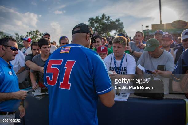 Former New York Yankee Bernie Williams signs autographs before the 2018 Eastern League All Star Game at Arm & Hammer Park on July 11, 2018 in...