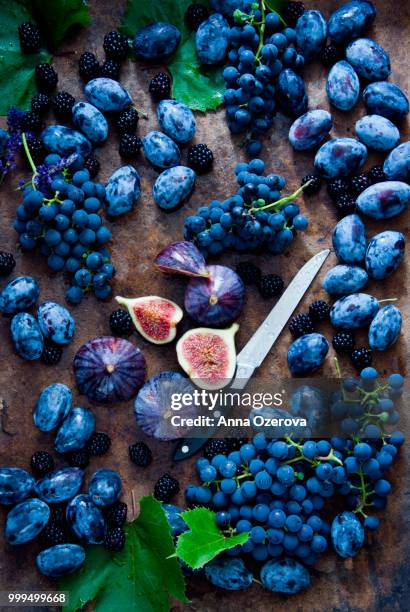fresh figs, grapes, prunes and dewberry - dewberry stock pictures, royalty-free photos & images