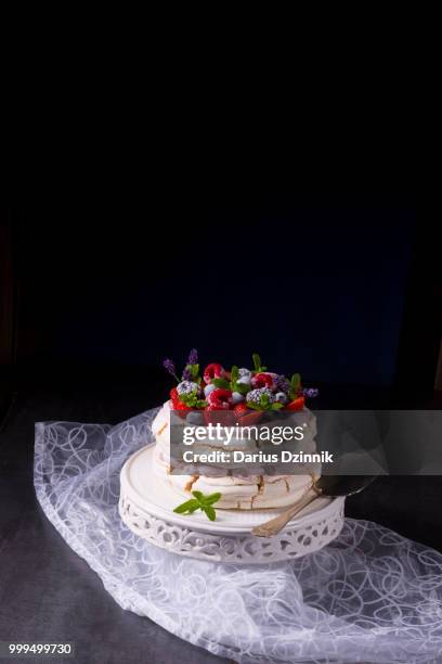 pavlova with berry fruits - berry stock-fotos und bilder