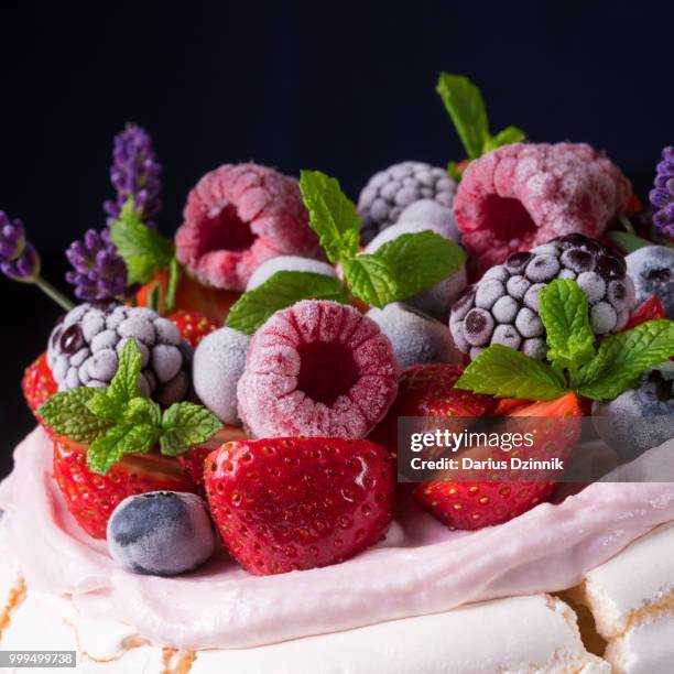 pavlova with berry fruits - berry stock-fotos und bilder