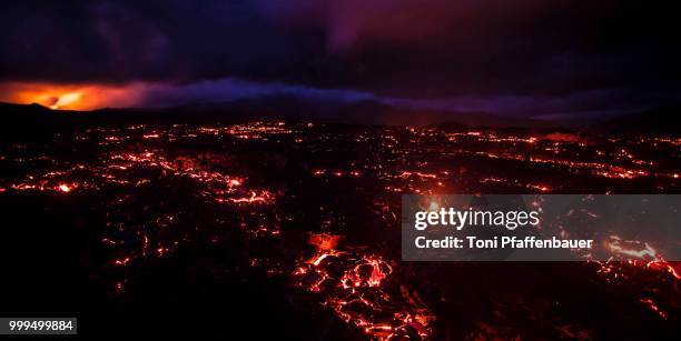 night panorama of the eruption of the tolbachik volcano, kamchatka, russia - russian far east stock pictures, royalty-free photos & images