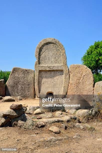 front with portal rock, giants' grave s'ena 'e thomes, bronze age, bonnanaro culture, in dorgali, province of nuoro, sardinia, italy - ena stock pictures, royalty-free photos & images