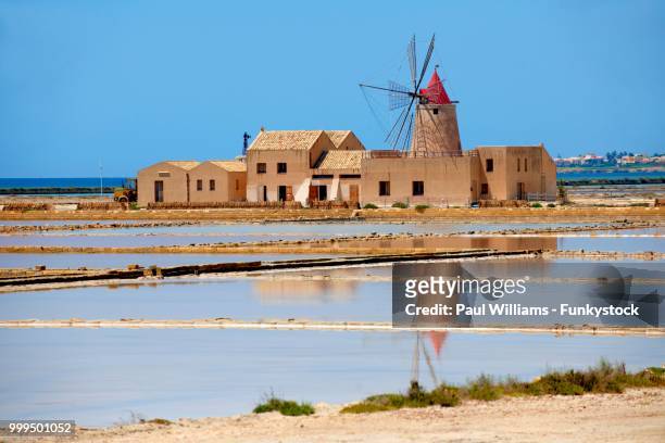 ettore e infersa salt mill and windmill with salt pans, masala, sicily, italy - marsala stock pictures, royalty-free photos & images