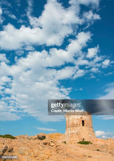 genoese tower with clouds, gulf of porto, corsica, france - genoese stock pictures, royalty-free photos & images