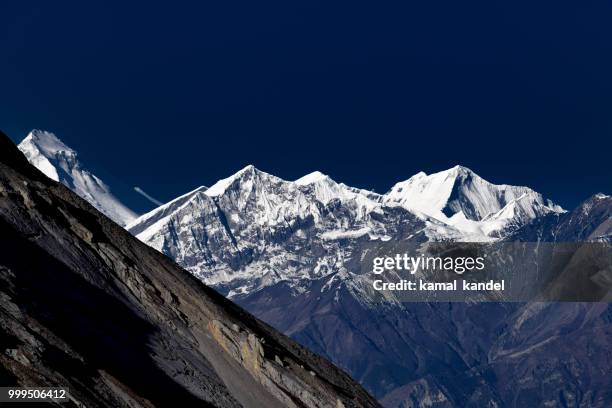 in the midst of himalayas !!! - kandeel stock pictures, royalty-free photos & images