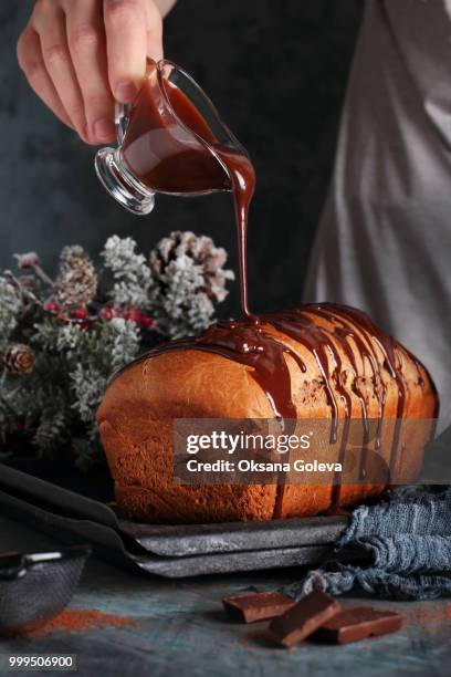 homemade chocolate bread with melted chocolate - bombe stock pictures, royalty-free photos & images