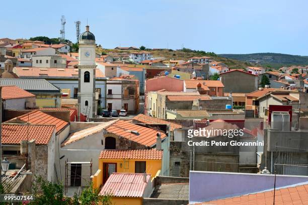 overview of the town with the basilica of sant'antioco, isola di sant'antioco, province of carbonia-iglesias, sardinia, italy - isola stock-fotos und bilder