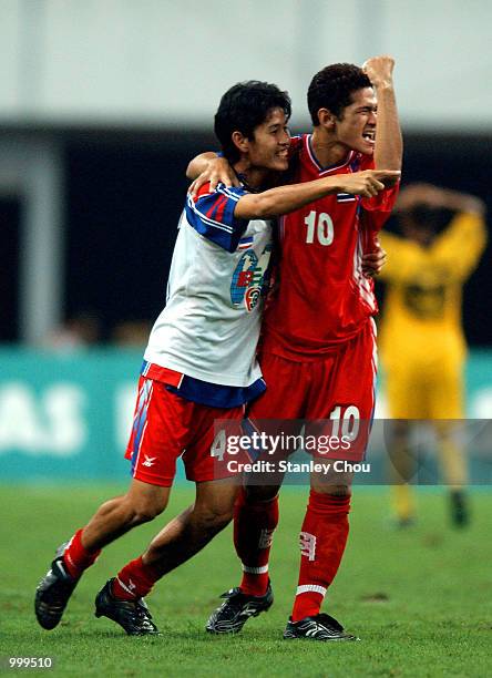 Kraikiat Beadtalu and Narongchai Vachiraban of Thailand celebrate during the Final match between Malaysia and Thailand held at the Shah Alam Stadium,...
