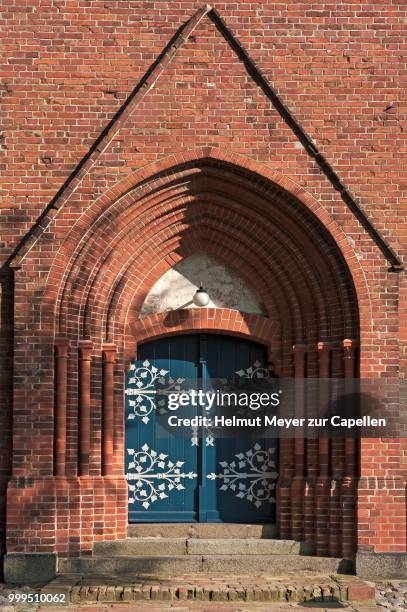 entrance portal of the neo-gothic parish church of wustrow, wustrow, mecklenburg-western pomerania, germany - entrance gate stock pictures, royalty-free photos & images