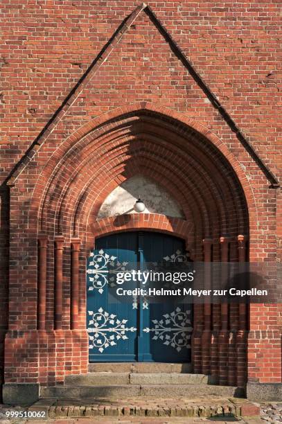 entrance portal of the neo-gothic parish church of wustrow, wustrow, mecklenburg-western pomerania, germany - neo stock pictures, royalty-free photos & images