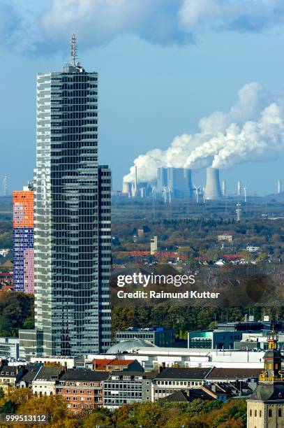 koelnturm tower in the mediapark, neurath coal-fired power plant of rwe at the back, grevenbroich, cologne, north rhine-westphalia, germany - von neurath stock-fotos und bilder