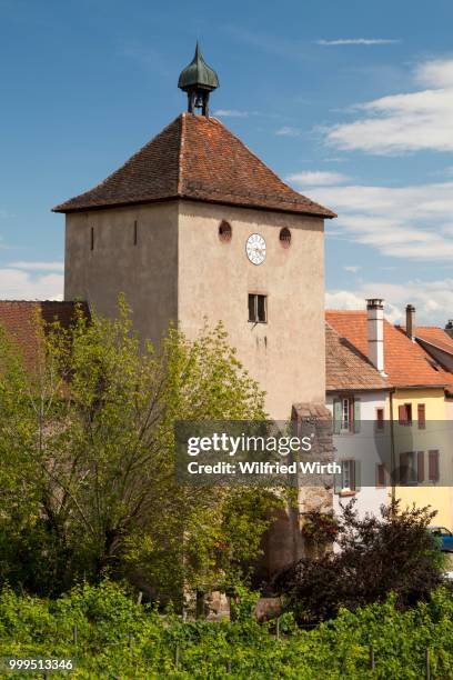 town gate at the place de la cathedrale, turckheim, alsace, france - city gate stock pictures, royalty-free photos & images