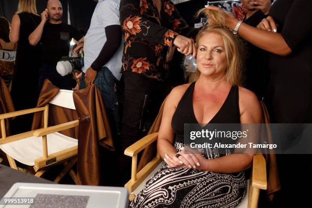 Designer Lourdes "Luli" Hanamian prepares backstage for Luli Fama during the Paraiso Fashion Fair at The Paraiso Tent on July 14, 2018 in Miami...