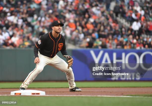 San Francisco Giants infielder Chase d'Arnaud reacts to a pitch in an MLB game between the San Francisco Giants and Oakland Athletics at AT&T Park in...