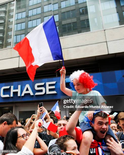 Fans celebrate France winning the World Cup final against Croatia during a watch party on July 15, 2018 in New York City. France beat Croatia 4-2 to...