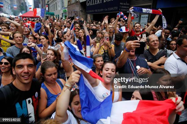 Fans celebrate France winning the World Cup final against Croatia during a watch party on July 15, 2018 in New York City. France beat Croatia 4-2 to...