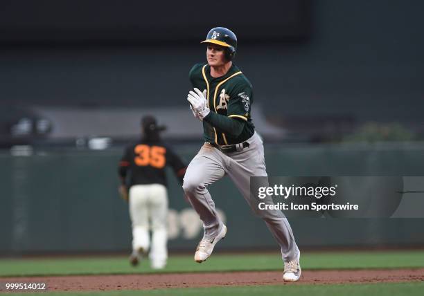 Oakland Athletics third baseman Matt Chapman runs to third in an MLB game between the San Francisco Giants and Oakland Athletics at AT&T Park in San...