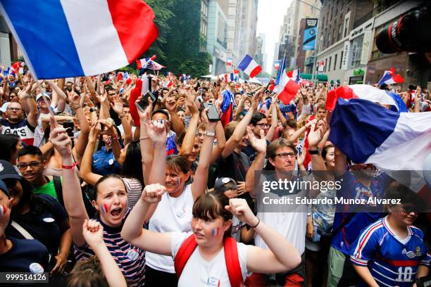 Fans celebrate France winning the World Cup final against Croatia during a watch party on July 15, 2018 in New York City. France beat Croatia 4-2 to...