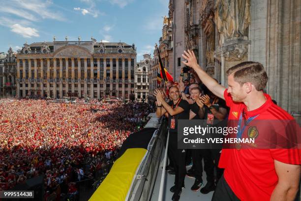 Belgium's Jan Vertonghen celebrates at the balcony in front of more than 8000 supporters at the Grand-Place, Grote Markt in Brussels city center, as...