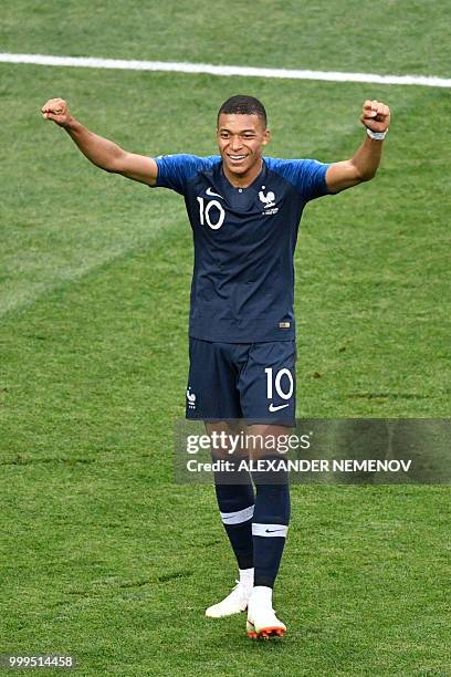 France's forward Kylian Mbappe celebrates after scoring a goal during the Russia 2018 World Cup final football match between France and Croatia at...