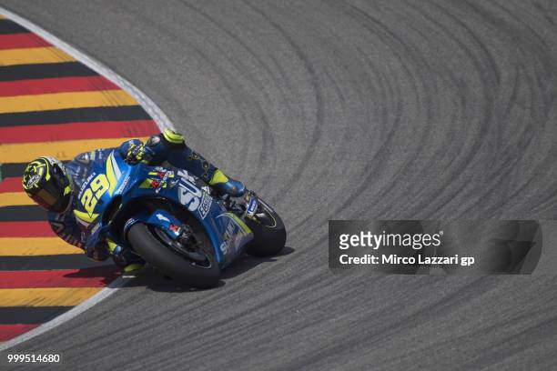 Andrea Iannone of Italy and Team Suzuki ECSTAR rounds the bend during the MotoGP race during the MotoGp of Germany - Race at Sachsenring Circuit on...