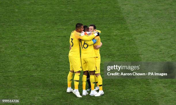 France goalkeepers Alphonse Areola , Steve Mandanda and Hugo Lloris celebrate after winning the FIFA World Cup Final at the Luzhniki Stadium, Moscow.