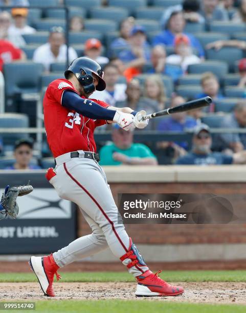 Bryce Harper of the Washington Nationals in action against the New York Mets at Citi Field on July 14, 2018 in the Flushing neighborhood of the...