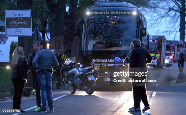 View of the broken window of the team bus of the soccer team of Borussia Dortmund, close to which three explosions occured in the evening in...