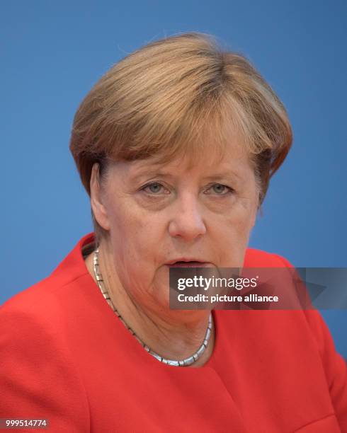 German Chancellor Angela Merkel speaks on current topics of interior and exterior policies at the summer press conference at the federal press...