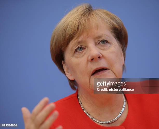 German Chancellor Angela Merkel speaks on current topics of interior and exterior policies at the summer press conference at the federal press...