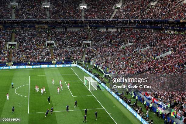 France players celebrate after Mario Mandzukic of Croatia scores an own goal from Antoine Griezmann of France's free-kick, France's first goal during...