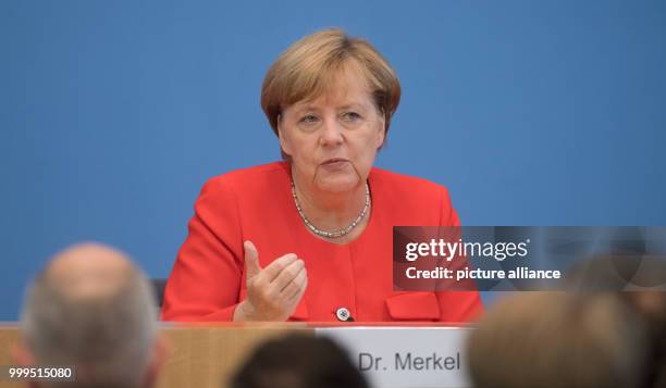 German Chancellor Angela Merkel speaks on current topics of interior and exterior policies at the summer press conference at the federal press...