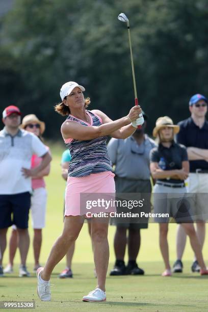 Juli Inkster plays her second shot on the sixth hole during the final round of the U.S. Senior Women's Open at Chicago Golf Club on July 15, 2018 in...