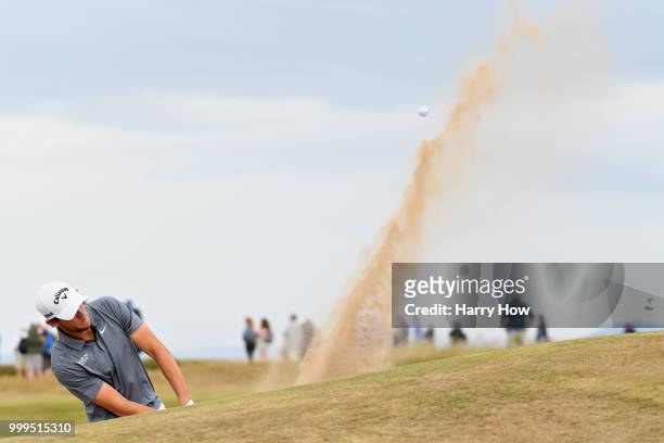 Thomas Pieters of Belgium plays out of the bunker on hole thirteen during day four of the Aberdeen Standard Investments Scottish Open at Gullane Golf...