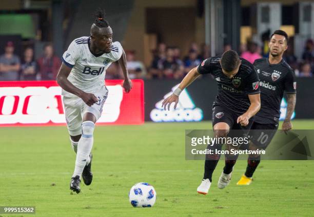 United defender Joseph Mora chases after Vancouver Whitecaps forward Kei Kamara during a MLS match between D.C. United and the Vancouver Whitecaps on...