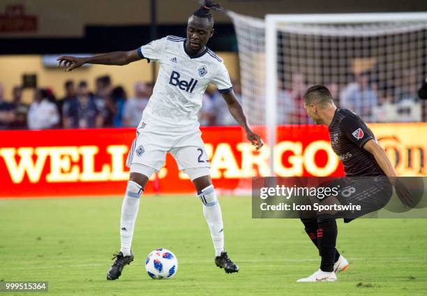 United defender Joseph Mora defends against Vancouver Whitecaps forward Kei Kamara during a MLS match between D.C. United and the Vancouver Whitecaps...