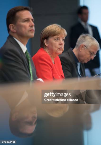 German Chancellor Angela Merkel speaks on current topics of interior and exterior policies at the summer press conference at the federal press...